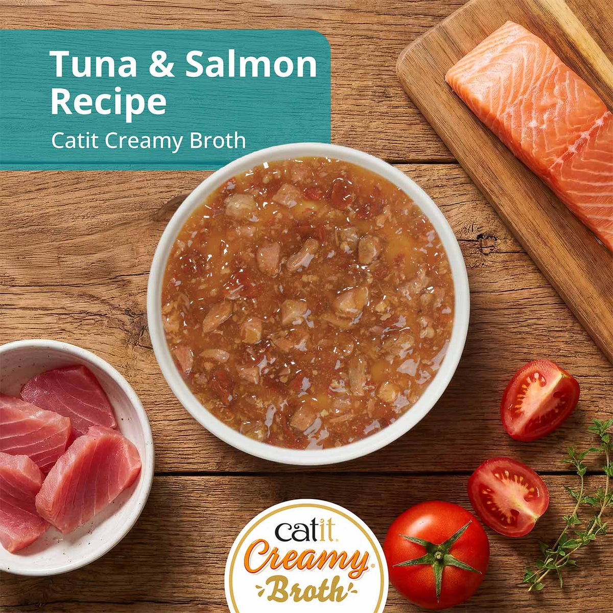 Catit Creamy Broth Tuna & Salmon Cat Treats - Tuna & Salmon broth in a bowl with fresh ingredients - PetMax Canada