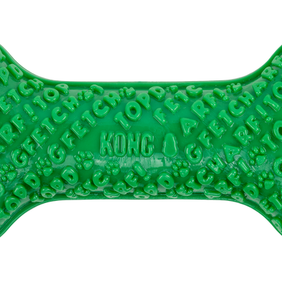 Kong Holiday Core Strength Bone Dog Toy - Green - close-up of raised lettering and paw-print texture - Kong - PetMax Canada