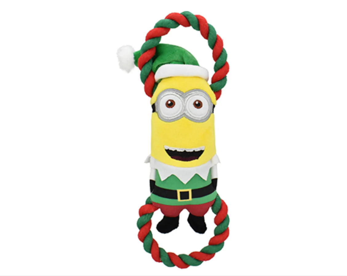 Minion toy with elf costume and rope on a white background