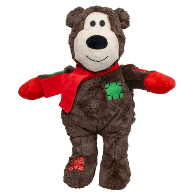 Kong Holiday Wild Knots Jumbo Bear Dog Toy - Brown - front view of the dark brown plush bear with red scarf and mittens - Kong - PetMax Canada