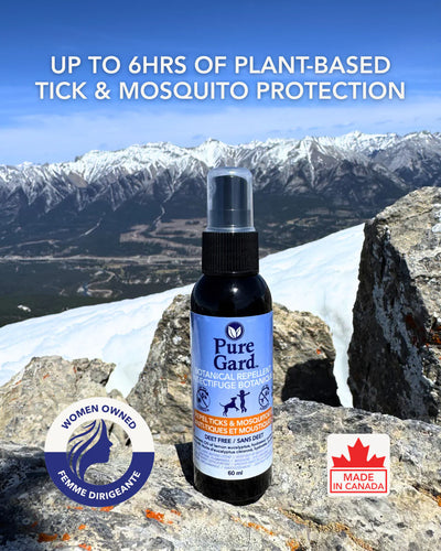 Pure Gard spray bottle with mountainous background