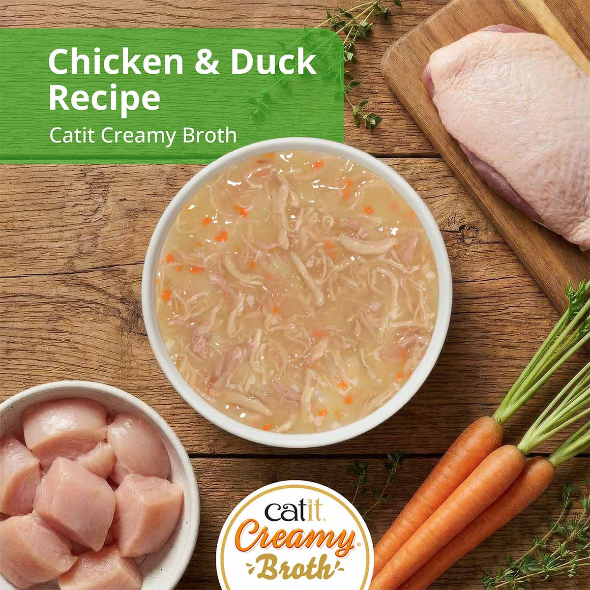 Catit Creamy Broth Chicken & Duck Cat Treats - Chicken & Duck broth in a bowl with fresh ingredients - PetMax Canada