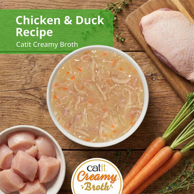 Catit Creamy Broth Chicken & Duck Cat Treats - Chicken & Duck broth in a bowl with fresh ingredients - PetMax Canada