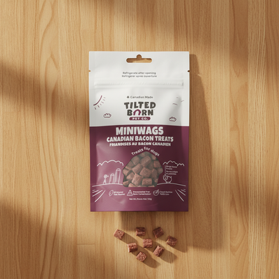 Tilted Barn Pet Co. Miniwags Canadian Bacon treats packaging on a wooden surface